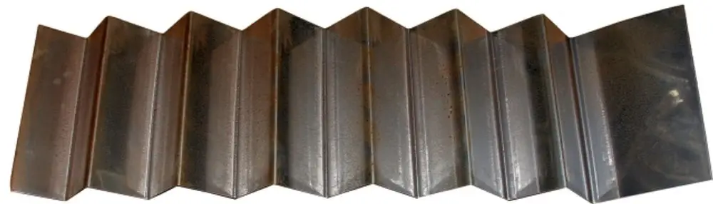 Turbolator für Heiztechnik, gefertigt aus Metall mit gefalteter Struktur. Das Produkt ist für die Verwendung in Wolf-Systemen ausgelegt.